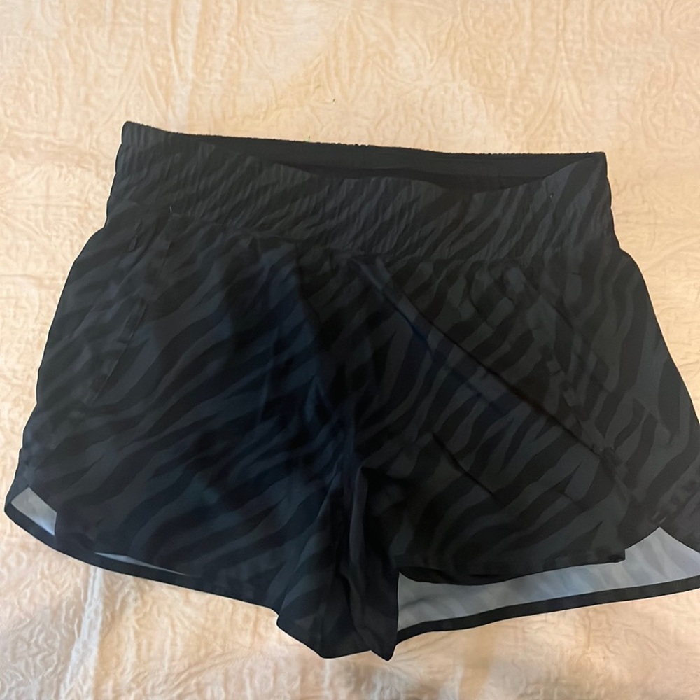 Brand new. Never worn. Athletic shorts